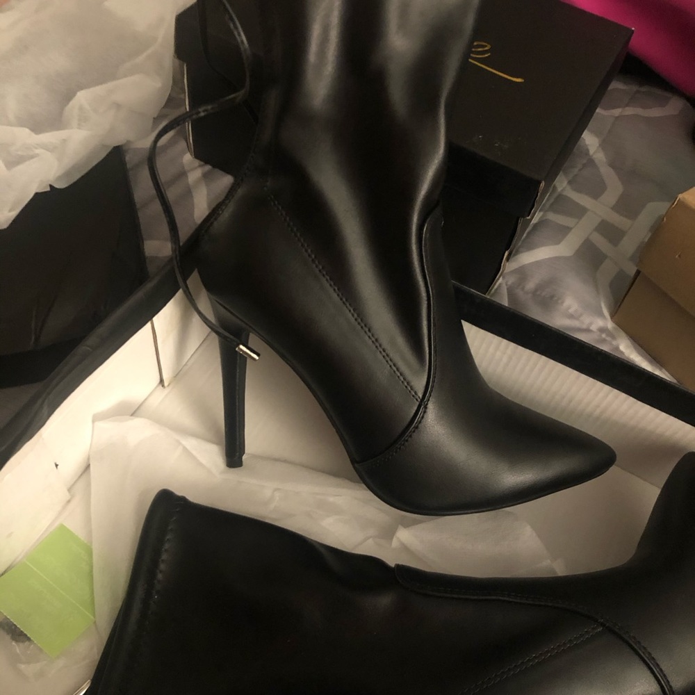 Pretty little thing leather heeled booties